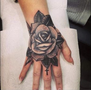 Hand rose tattoo by Dan from Walsall 