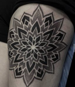 Spiritual symbolism in tattooing mandala