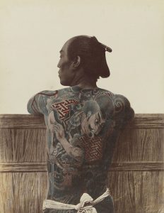 Japanese man with full back tattoo