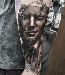 Black and Gray Statue Tattoo by Clayton