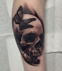 custom skull and butterfly tattoo
