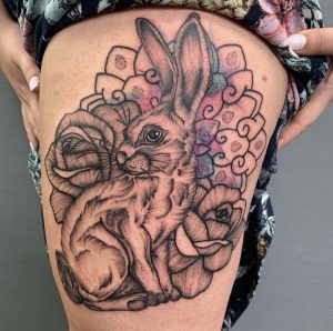 Rabbit and flower tattoo