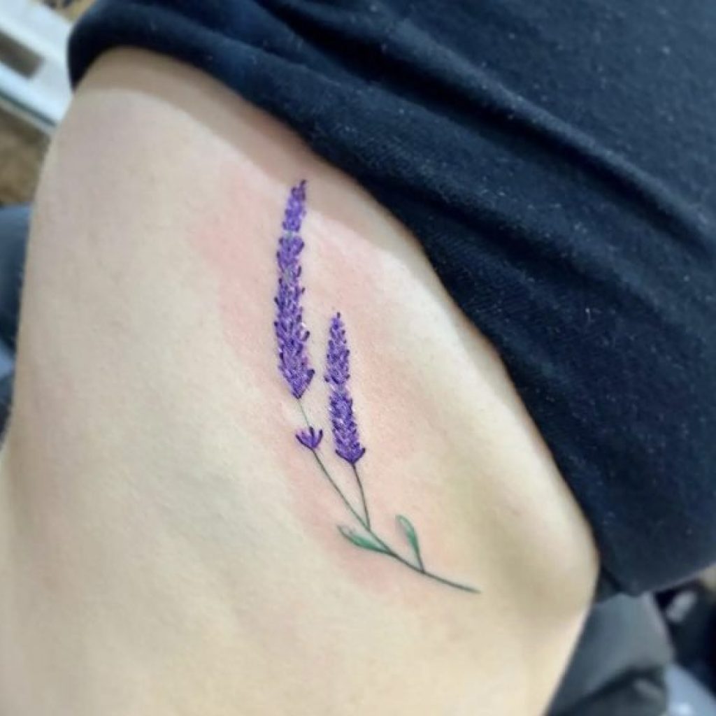 Ellie Goulding Gets Intricate Lotus Flower Tattoo on Her Ribcage  PopStarTats