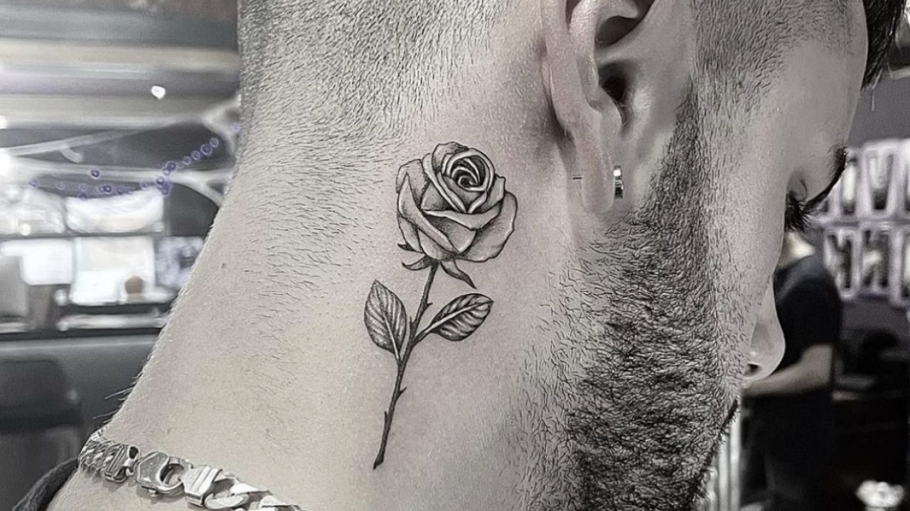 Rose on neck tattoo