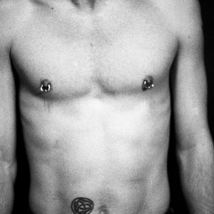 Man with nipples pierced