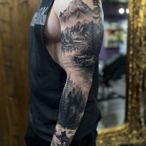 Man with full sleeve tattoo