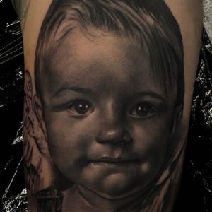 Portrait tattoo of a loved one