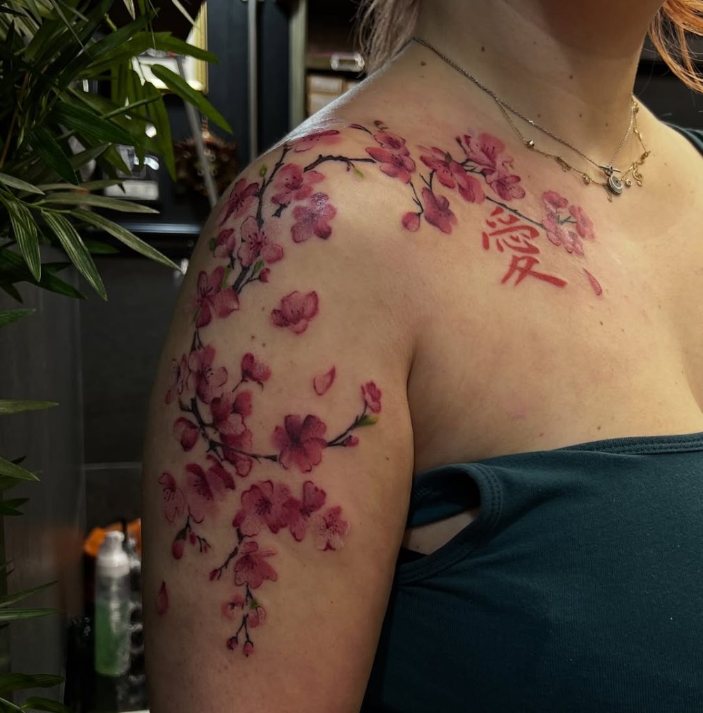 Beyond the Bloom: Why Botanical Tattoos Deserve a Second Look This Summer cherry blossom tattoo